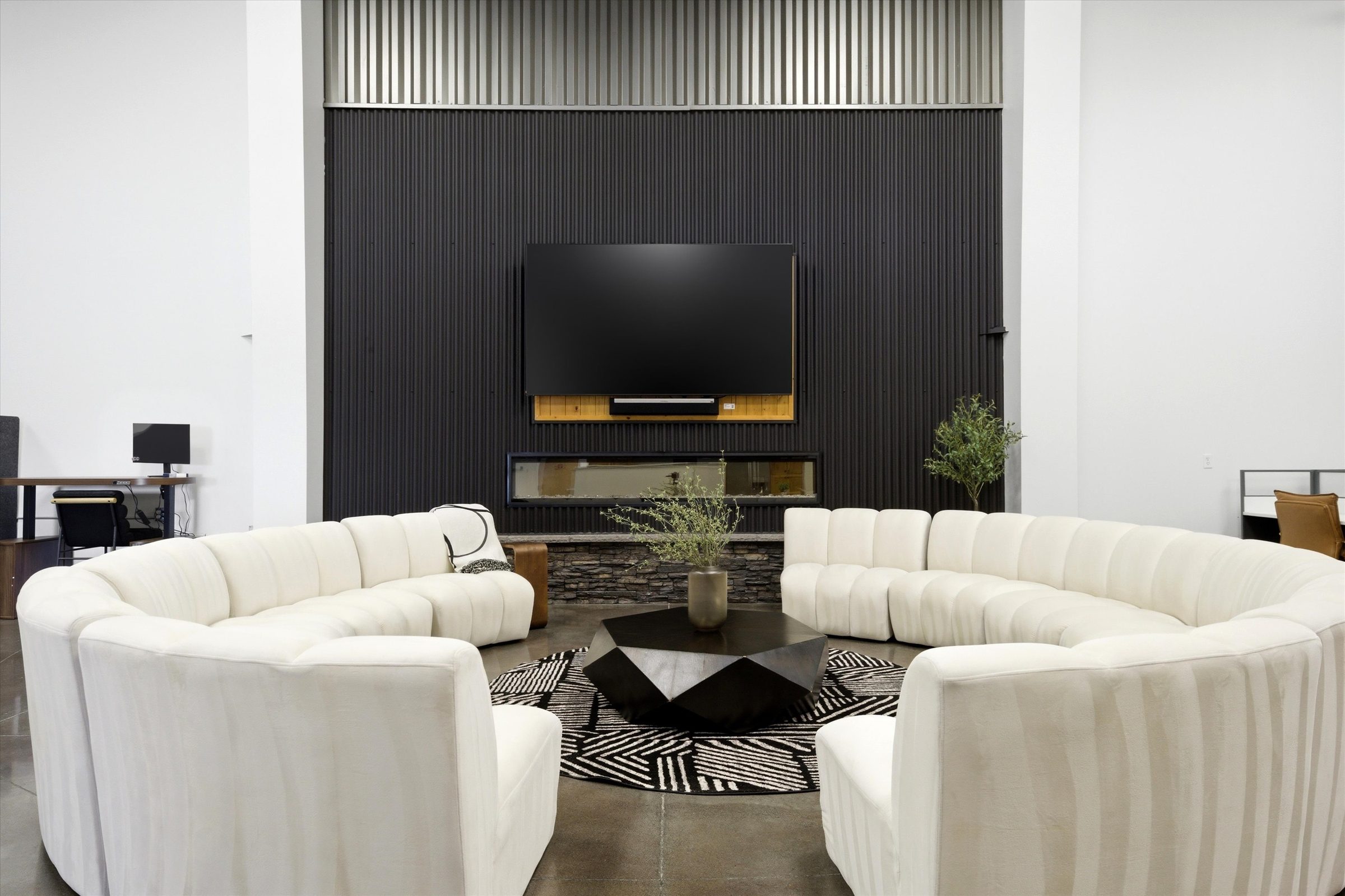 Double-height lounge and workspace inside Foyer 950